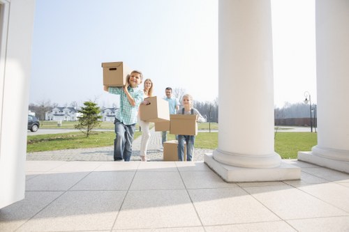 Professional movers handling a flat removal in Westhampstead