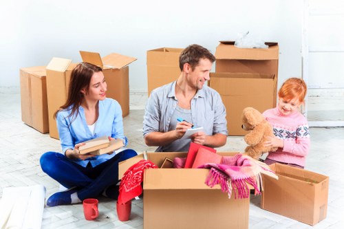 Man and van moving service in Westhampstead with packed boxes