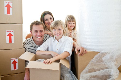 Packed boxes and furniture prepared for a West Hampstead flat move