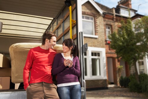 Packed moving boxes and furniture prepared for house removals